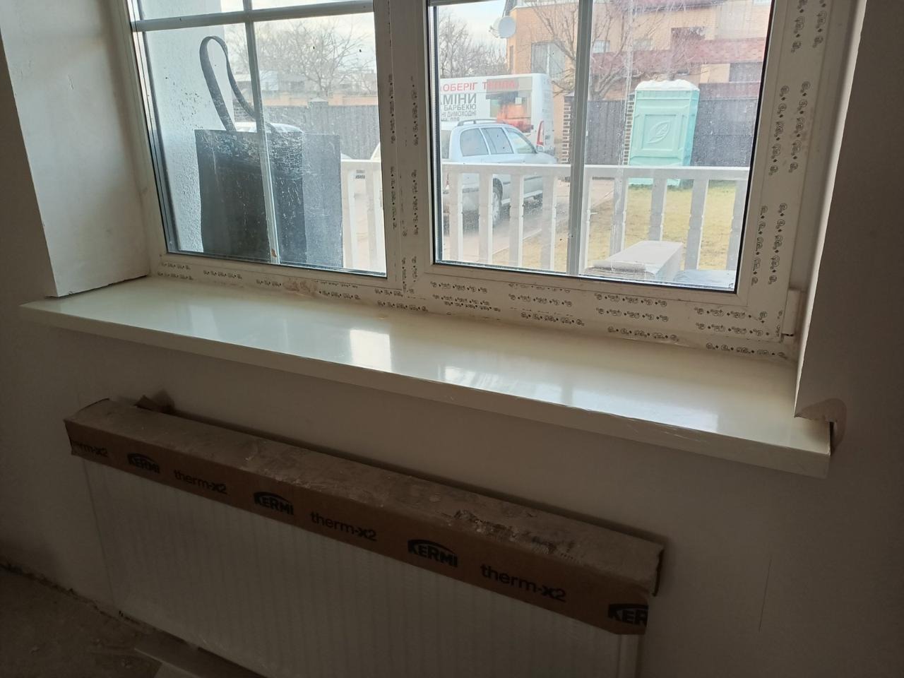 Як встановити підвіконня на вікно